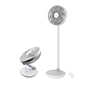Two white oscillating fans with remote controls on a white background